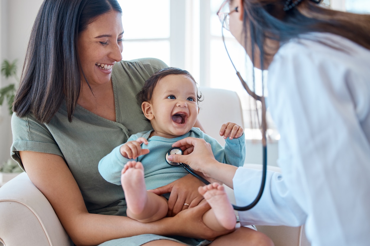 Mission of KidsStreet - Mom with baby and doctor.