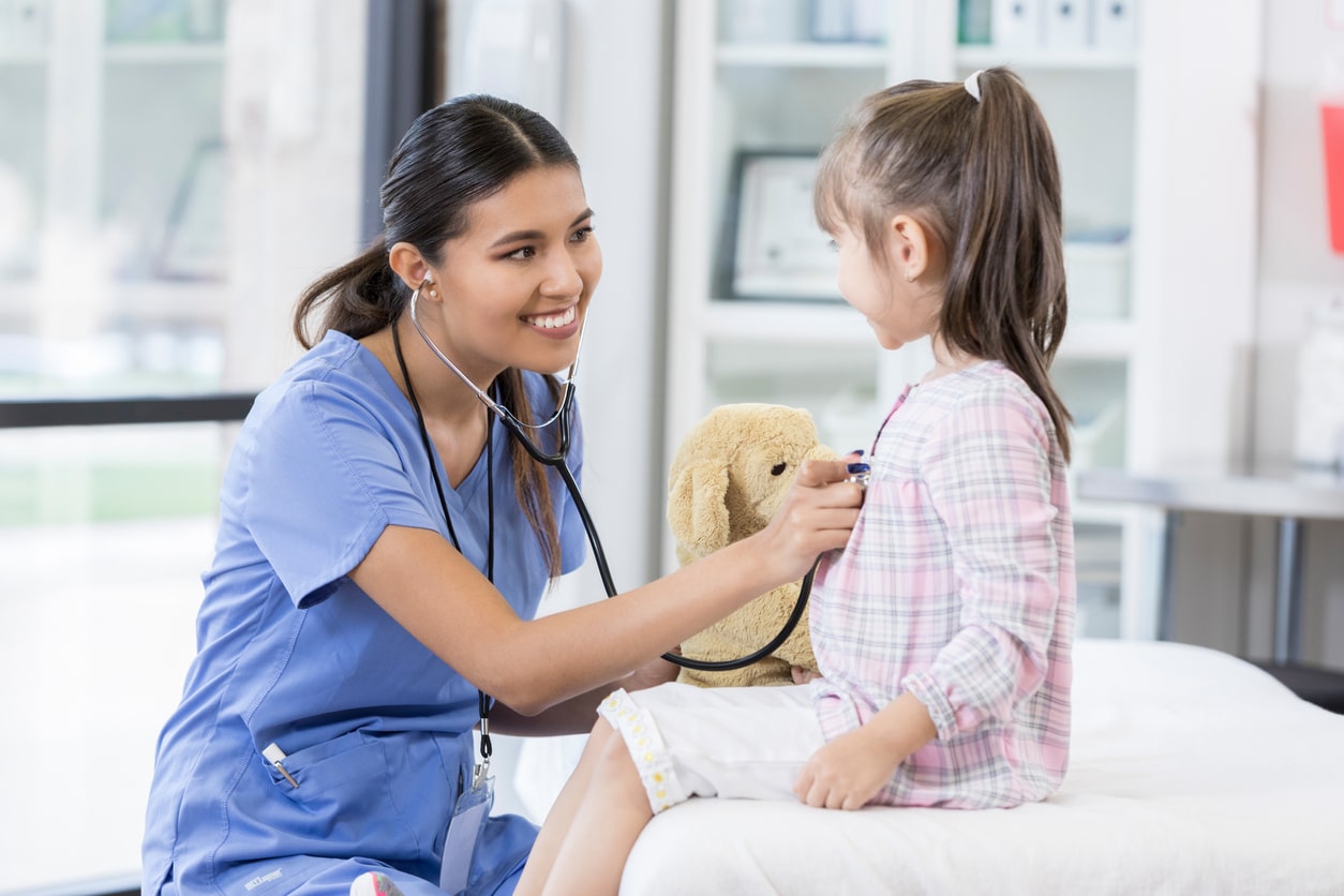 pediatric urgent care vs. emergency room little girl with nurse