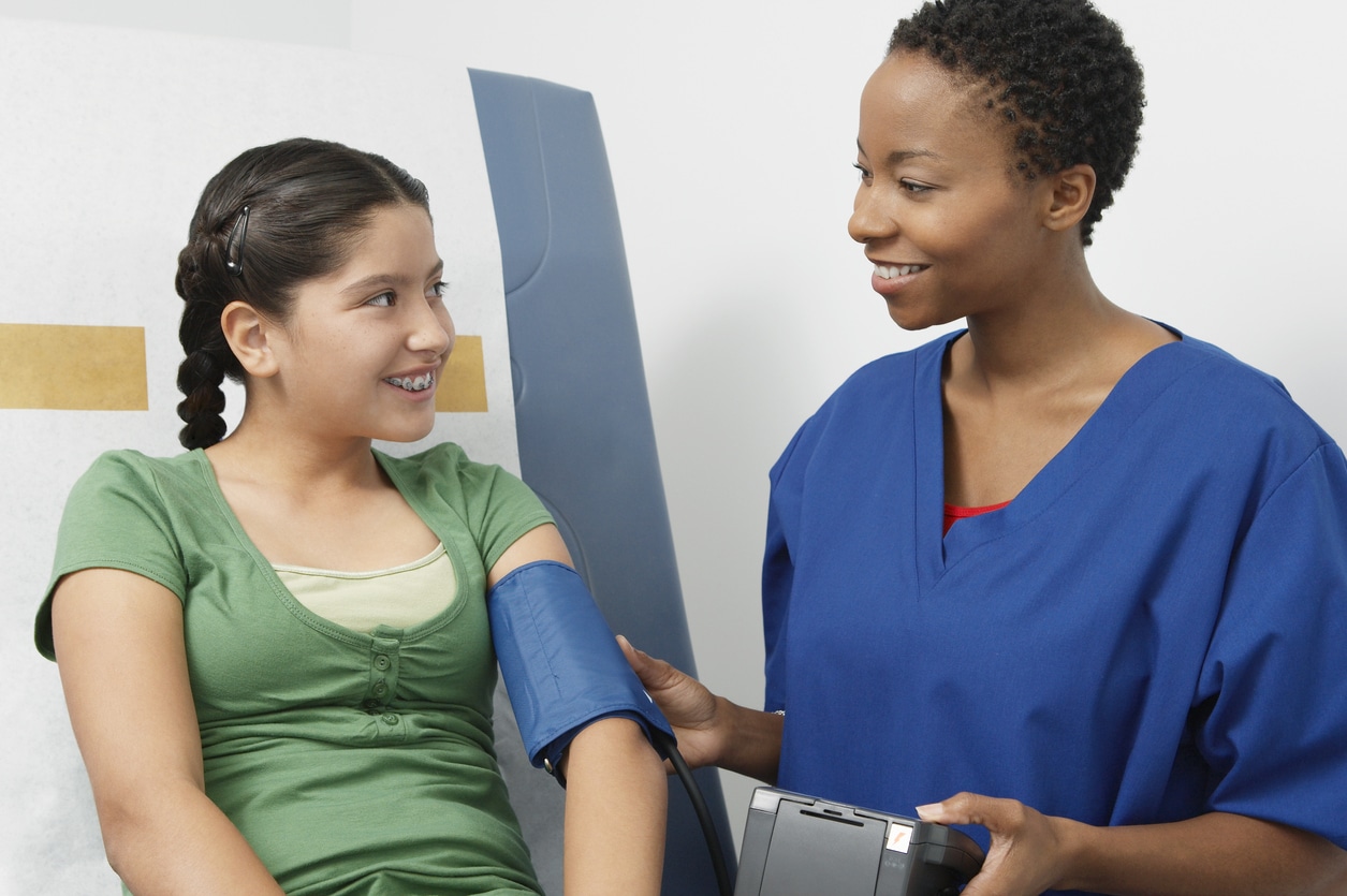 Nurse with a kid at an urgent care clinic