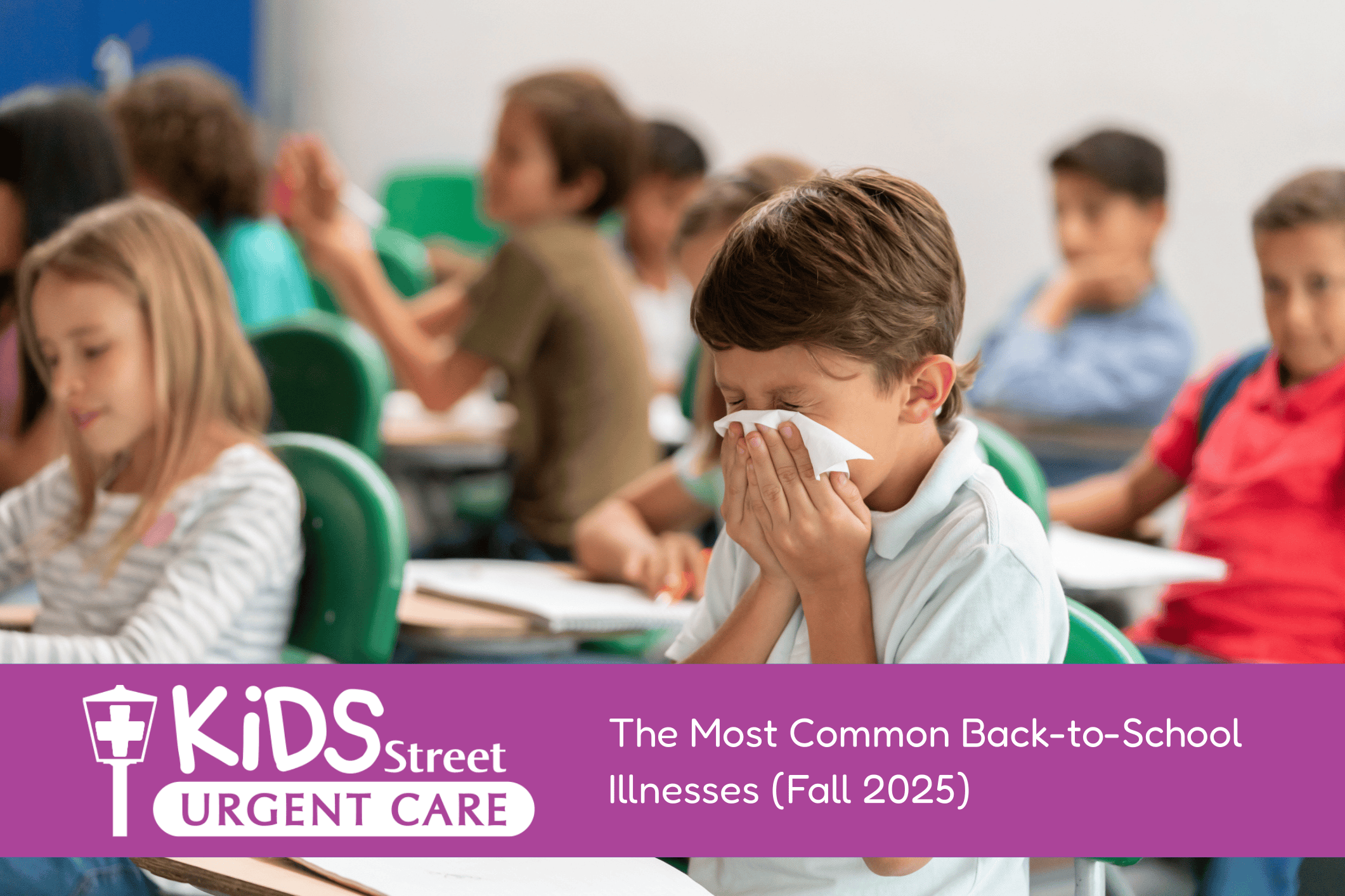 Little boy sneezing in a classroom of kids - back to school illnesses KidsStreet Urgent Care